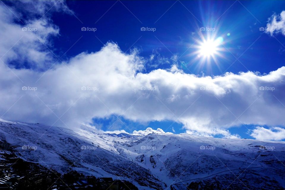 Mountains#snow#cold#sky#clouds