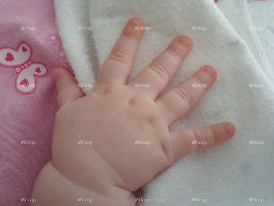 infant's hand. infant's hand