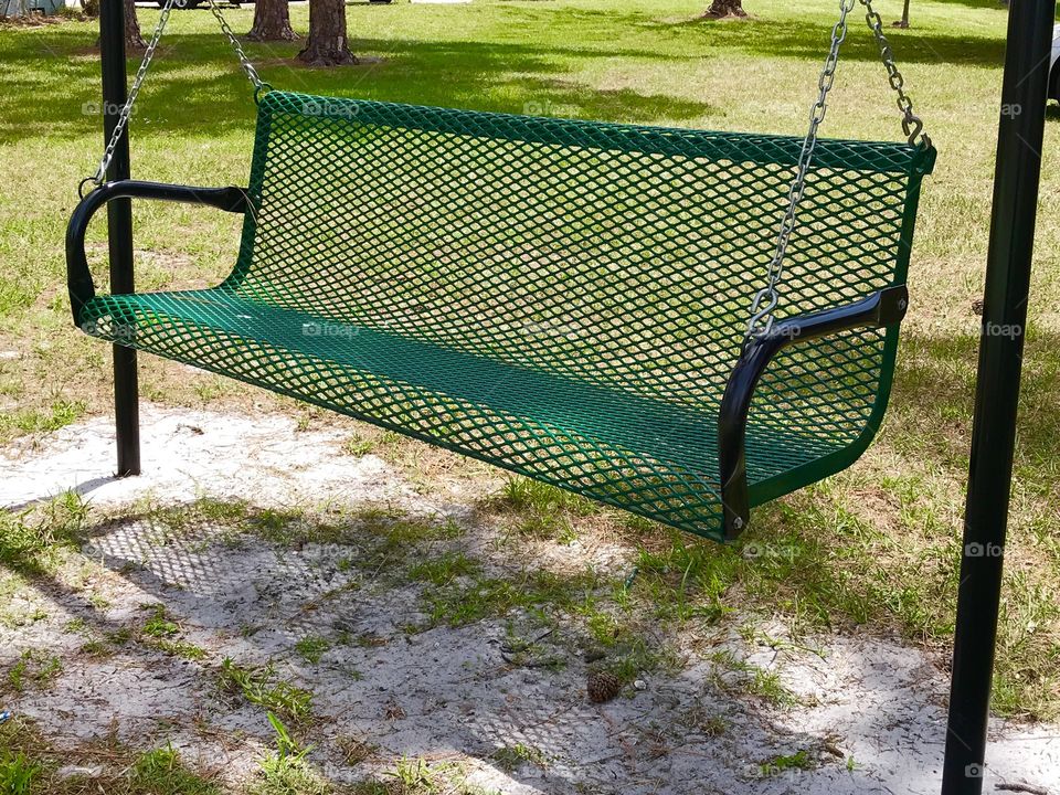 Green bench swing