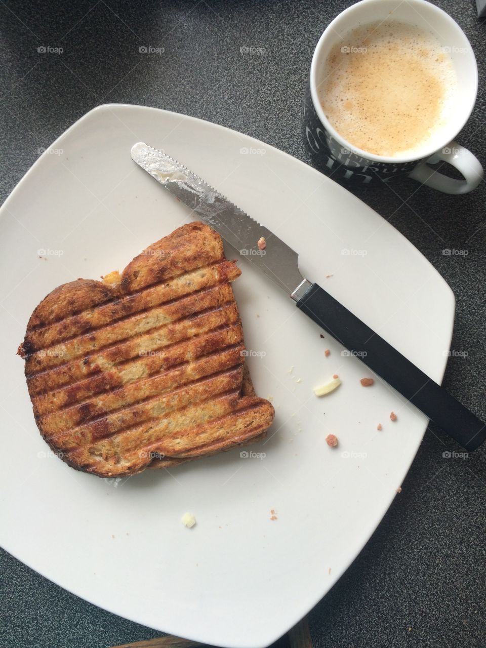 Breakfast panini with cappuccino 