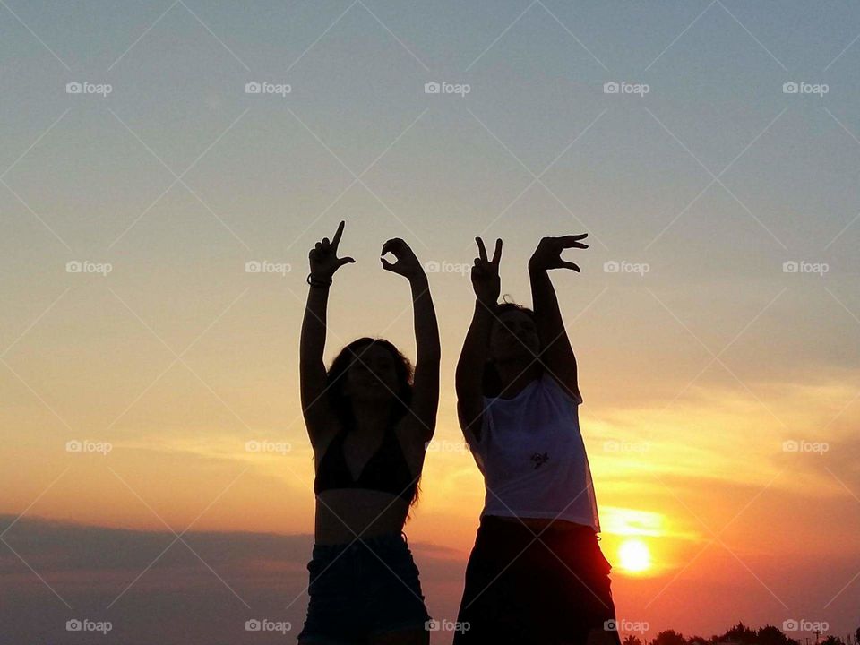 We are dancing on the sand together while the sunset is setting again.....!!!!