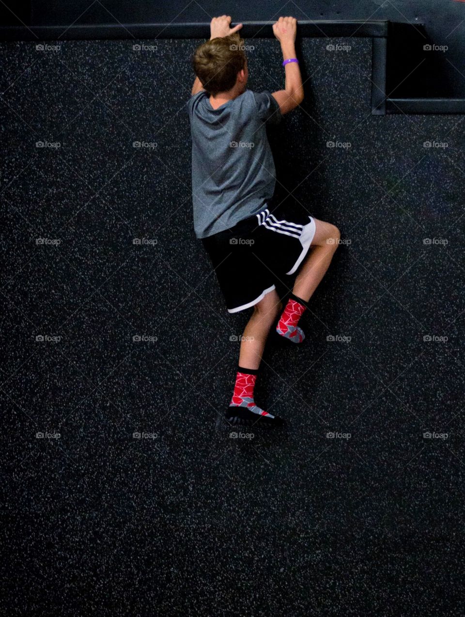 Determination to climb the wall