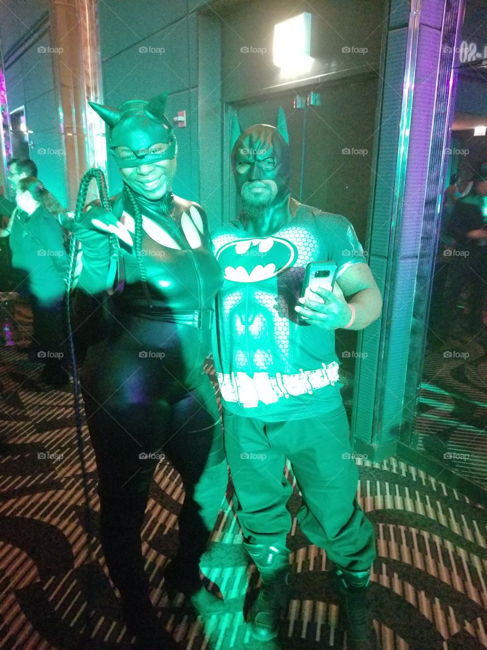 me n catwoman at a party