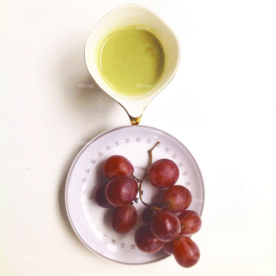Tea break with red grapes 