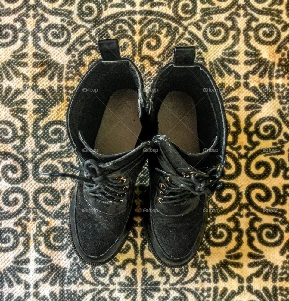 Black pair of shoes