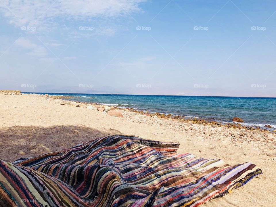 Colorful carpet on the beach 