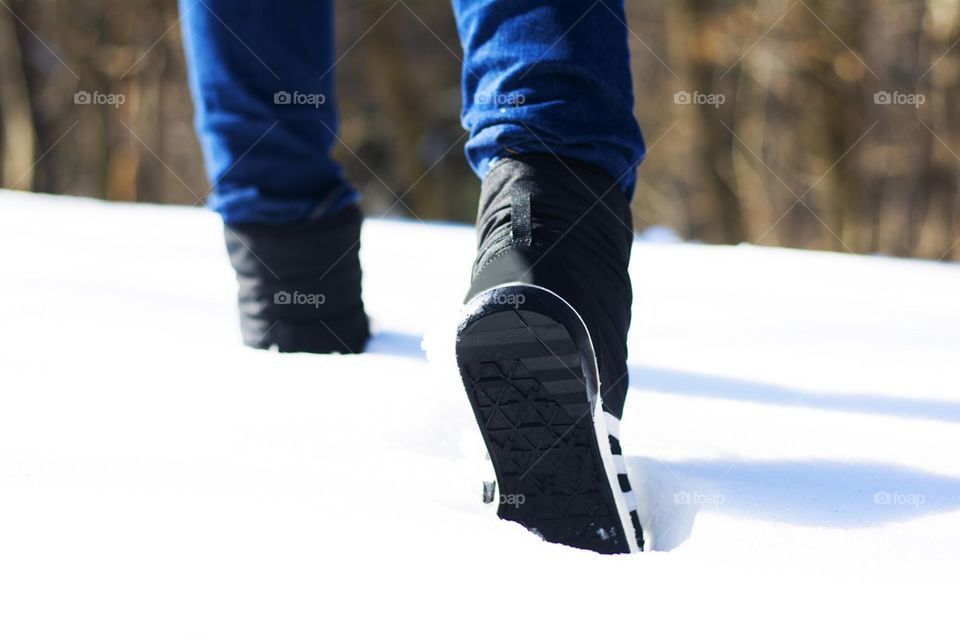 trekking boots in snow