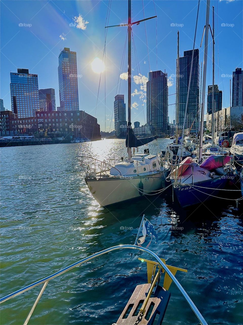 This is beautiful “Newtown Creek” by the “Pulaski Bridge” in LIC, Queens shimmering gently in the evening sun. Across the waters of the “East River” we see “Greenpoint”, Bklyn on the left, LIC and “Manhattan” on the right. 2024. Hypnotic Productions