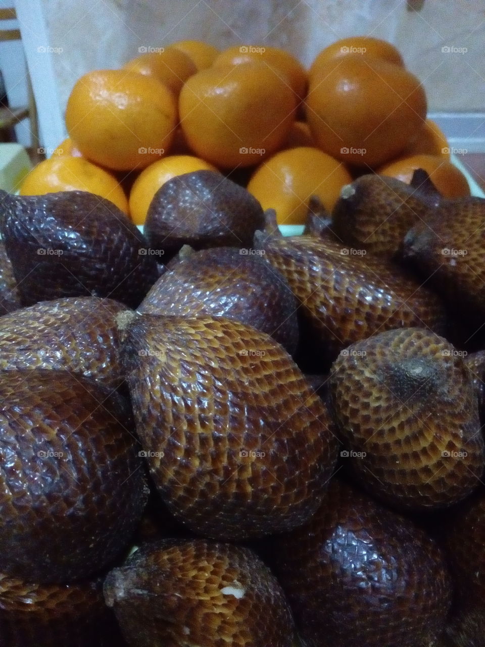 Salak and oranges