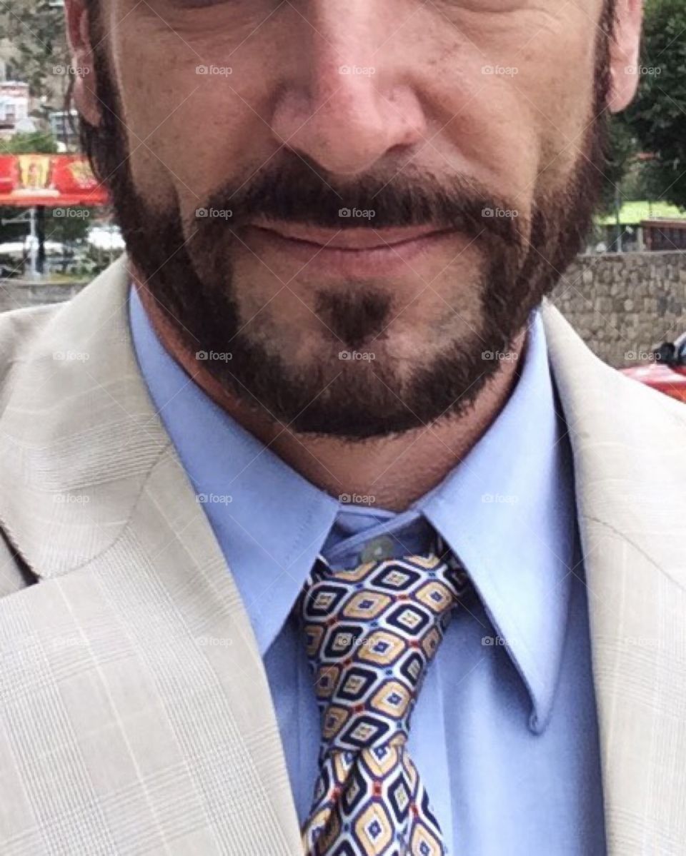 Wearing a Hipster Beard with a suit and tie