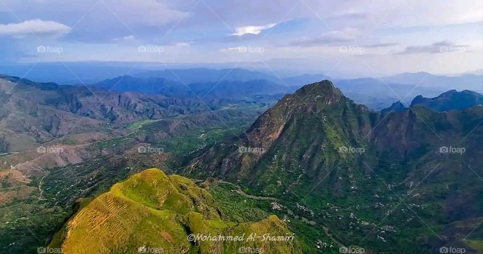 Glory be to God, the magnificent and picturesque view and the natural green trees are a view that is nothing more wonderful than it