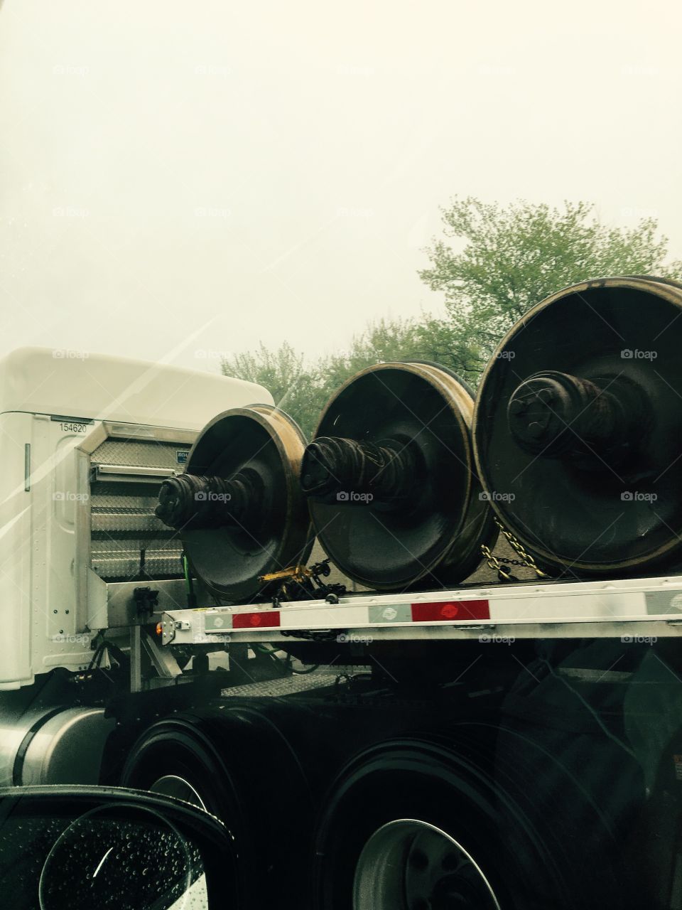 Truck carrying WHEELS FOR TRAINS