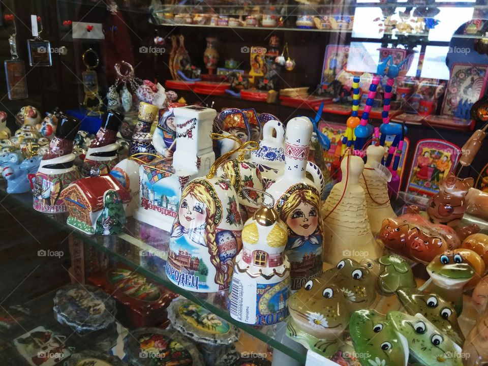 Russian Souvenirs. products of rural artisans of Russia laid out in the window.