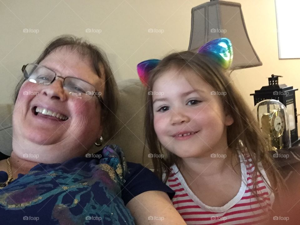 Relaxing Together On Couch In Living Room