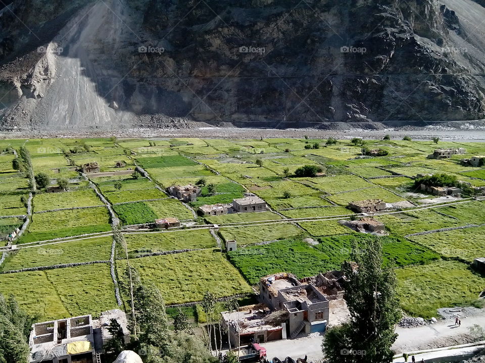 A scene of full village and field. This is a village of Leh, Laddakh called Bongdang Located in state of India. You can see the real beauty of the nature, that's why it's called heaven on earth