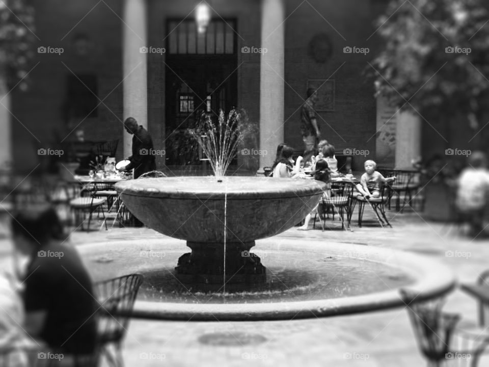Rozzelle Court Restaurant Fountain, Nelson Atkins Museum. The beautiful fountain in the Rozzelle Court Restaurant in the Nelson Atkins Museum rendered in black and white.