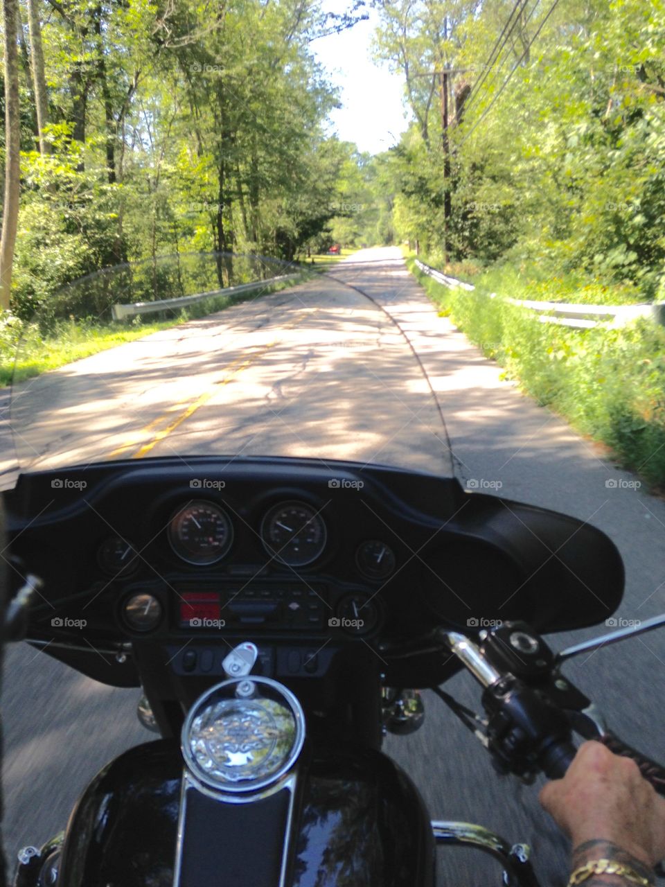 Riding our Harley down the back country roads of New England.