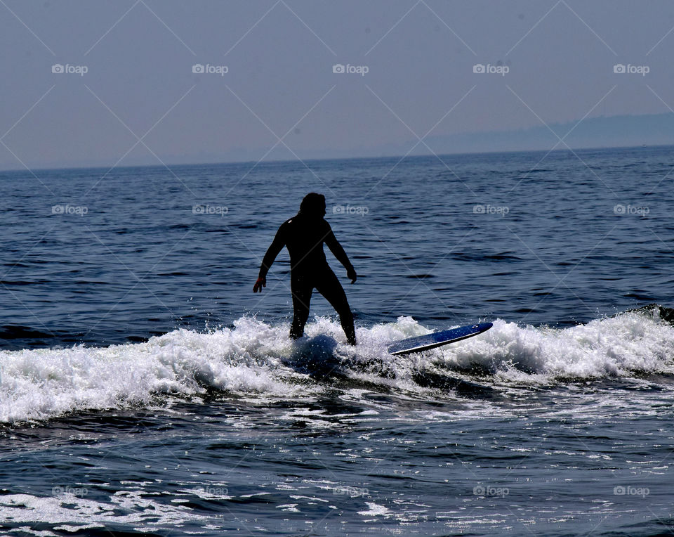 Surfing at Howard beach, NY
