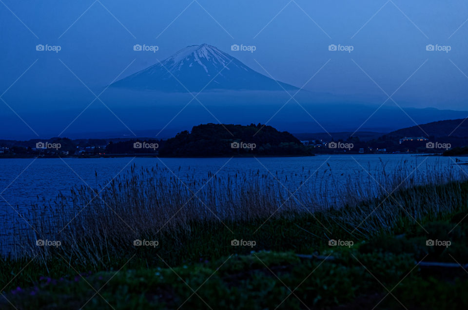 Mount Fuji, Fuji-san,  at blue hour,  from lake Kawaguchiko, Yamanashi prefecture