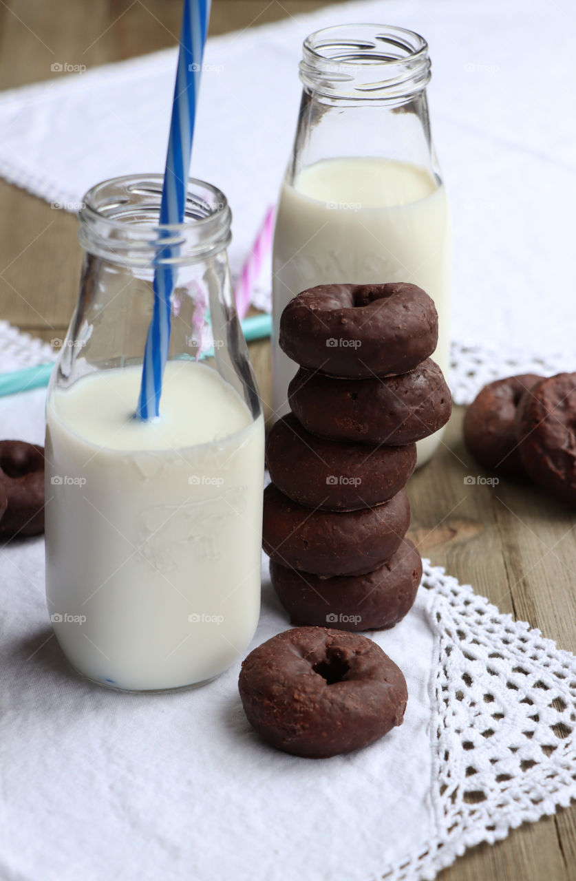 Chocolate donuts and milk