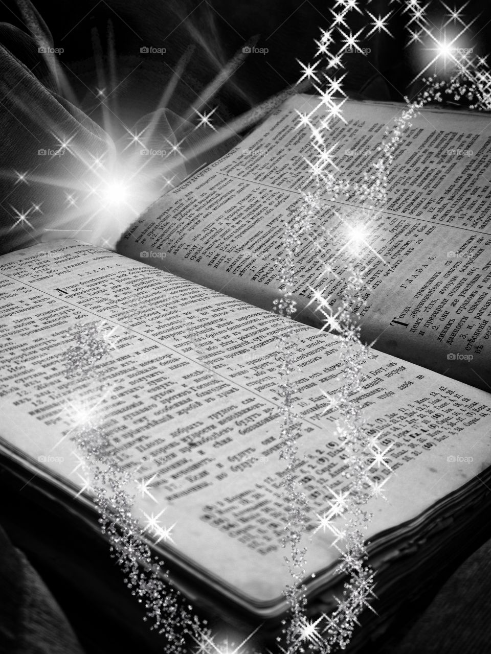 Old book in black and white color  and white spiral of stars