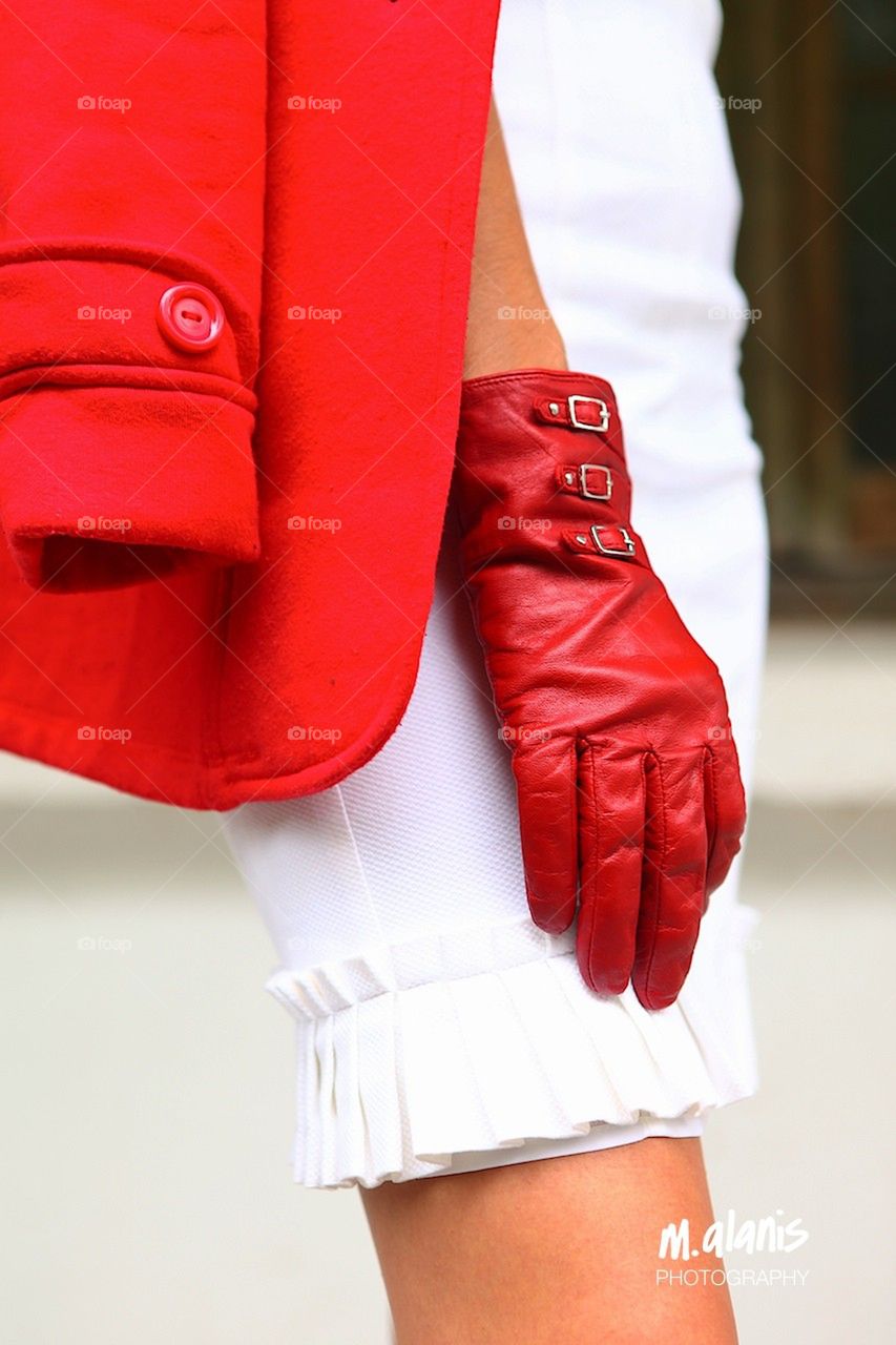 Classy woman with red leather gloves