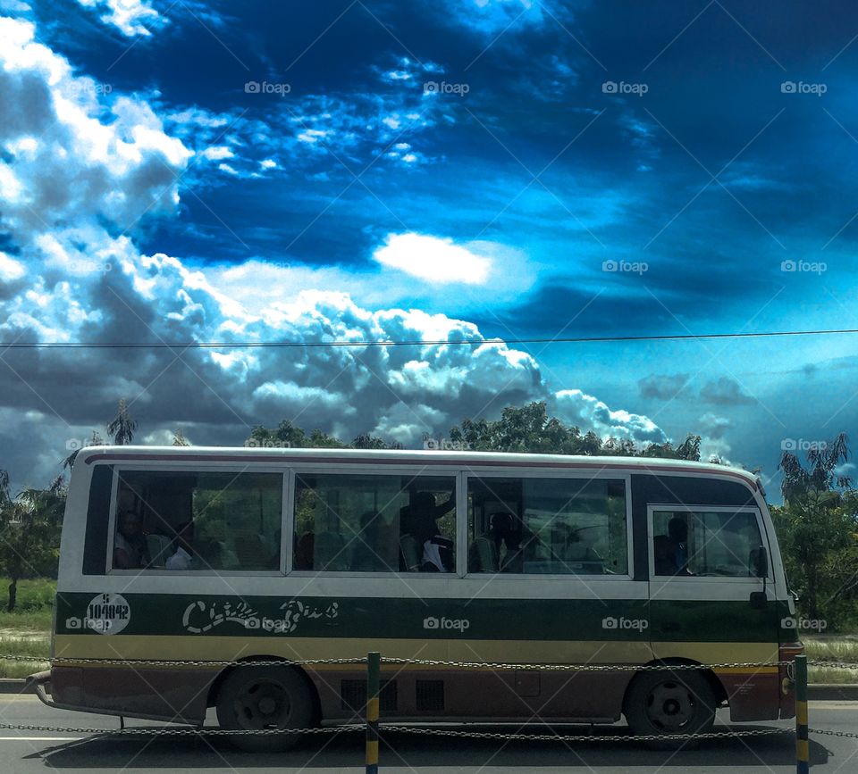 Bus, clouds and sky