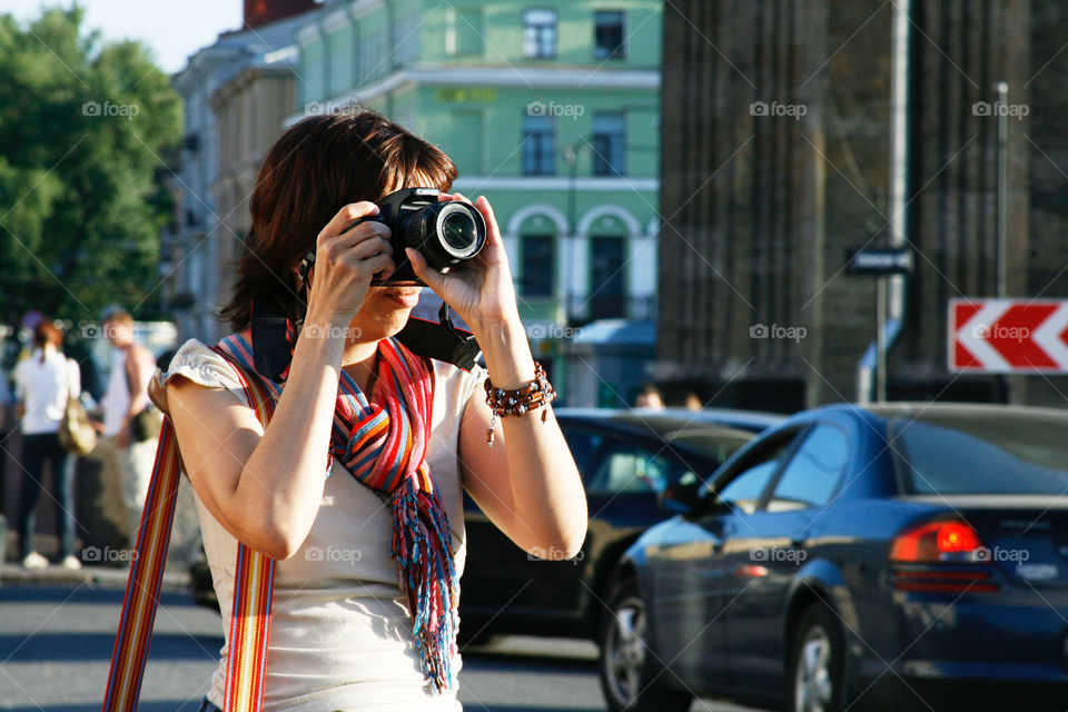 Woman photographer in the city 