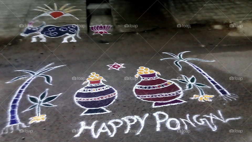 Street decoration by hand to celebrate Tamil festival of "Pongal" in India