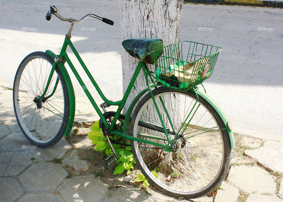 Ready to go with a green retro bike