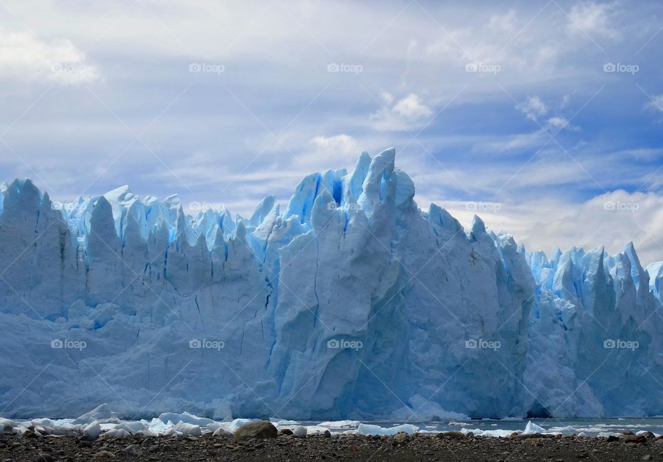 blue mountain in Patagônia perito moreno ice and sky