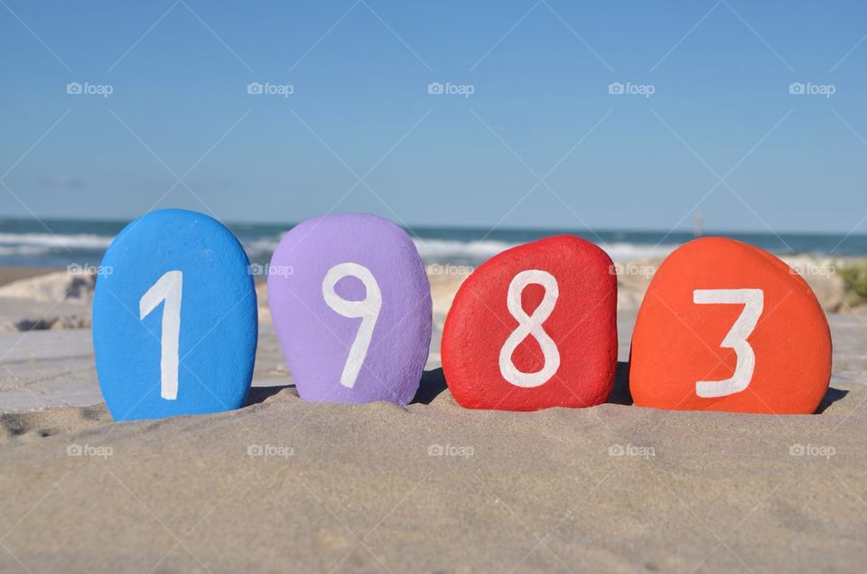 1983year 1983 on colourful stones