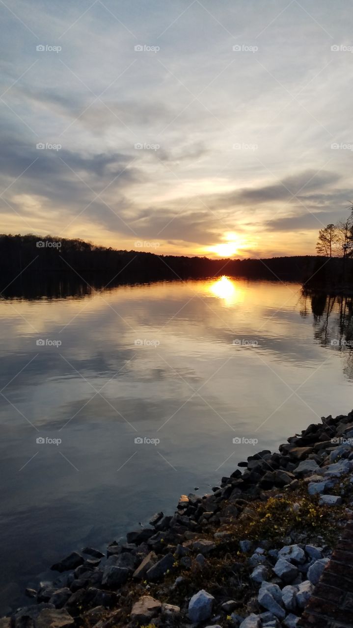 sunset over lake.