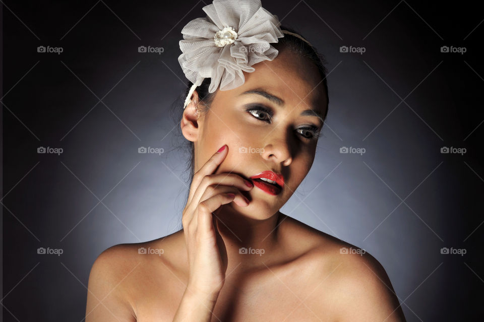 Women posing with flower headband 