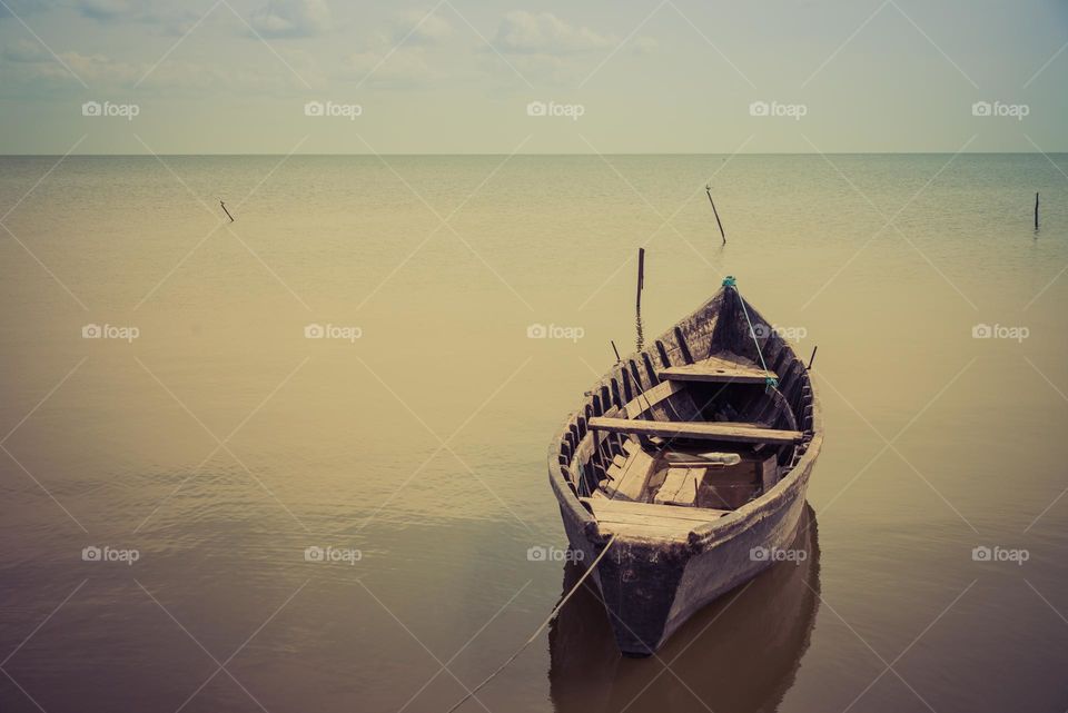 Wooden boat on the lake