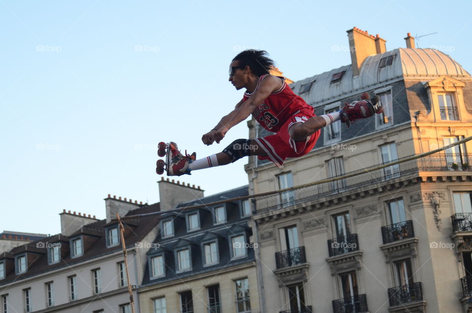 Street performer putting on a show outside of Notre Dame in Paris