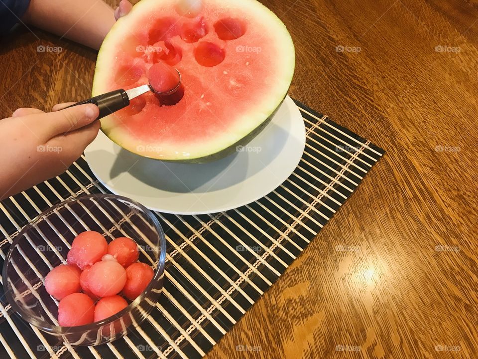 Delicious juicy red watermelon being served as fun round balls made from melon baller!! 