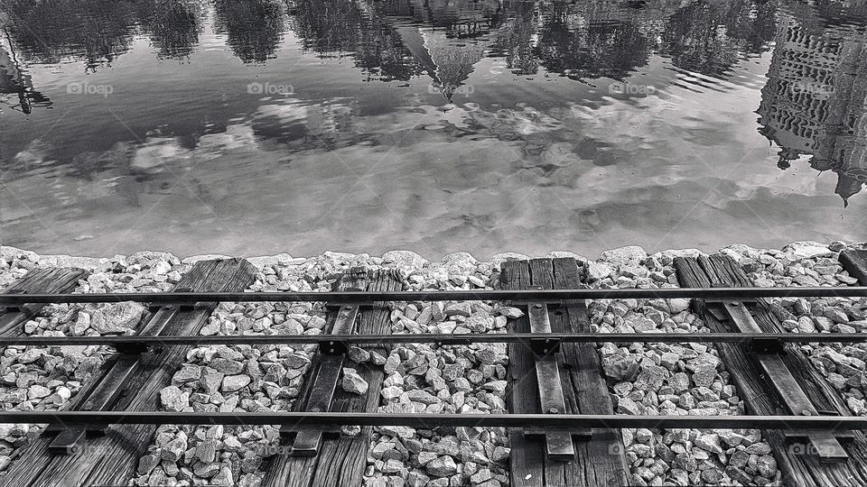 Track at the lake, black and white.