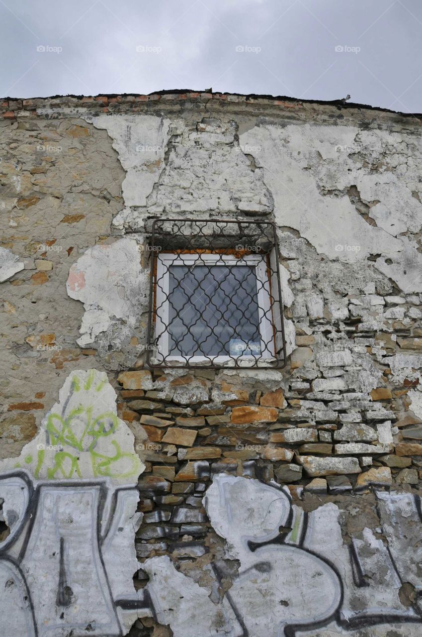 Old wall, sad window