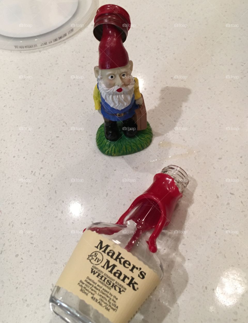 Gnomey hitting the bottle early in a Friday. Frivolous, carefree life of a traveling gnome...