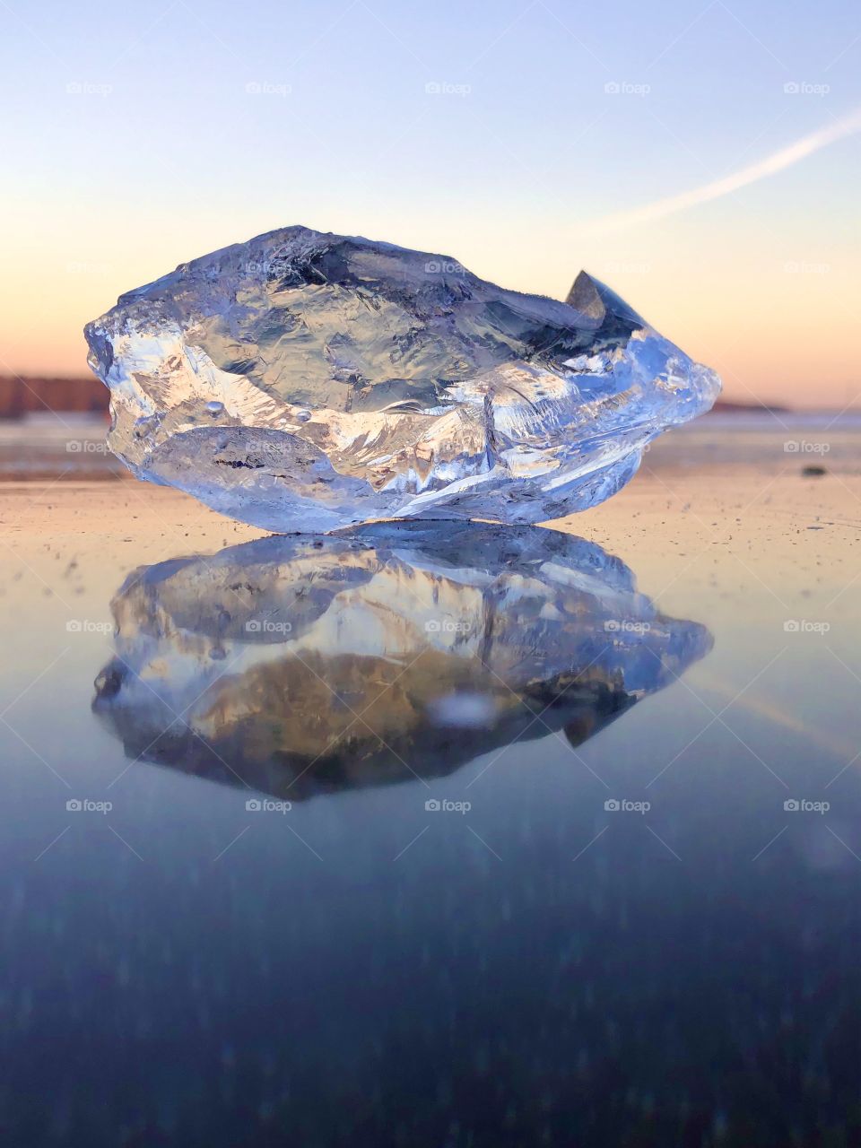 A piece of ice on a frozen lake