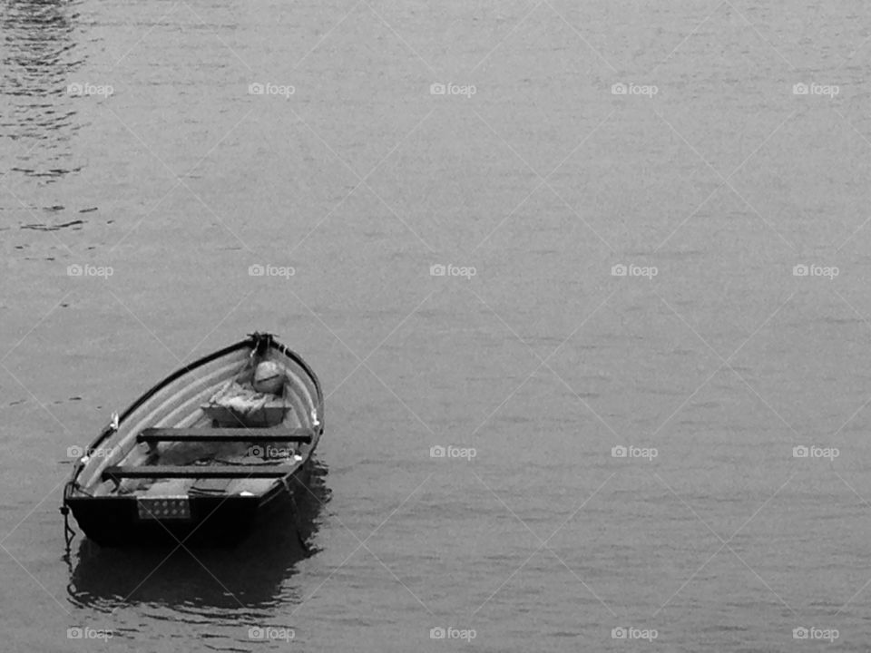 Row boat on water background copy space 