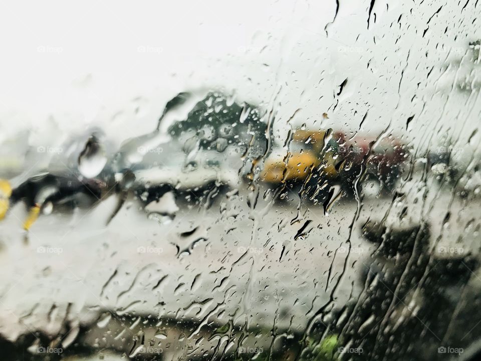 Raining.... roadside...... car..... blur