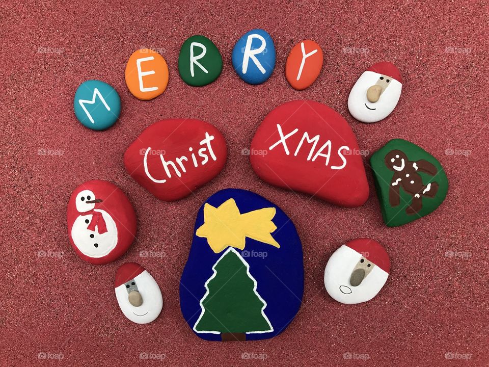 Merry Christmas message with colored stones