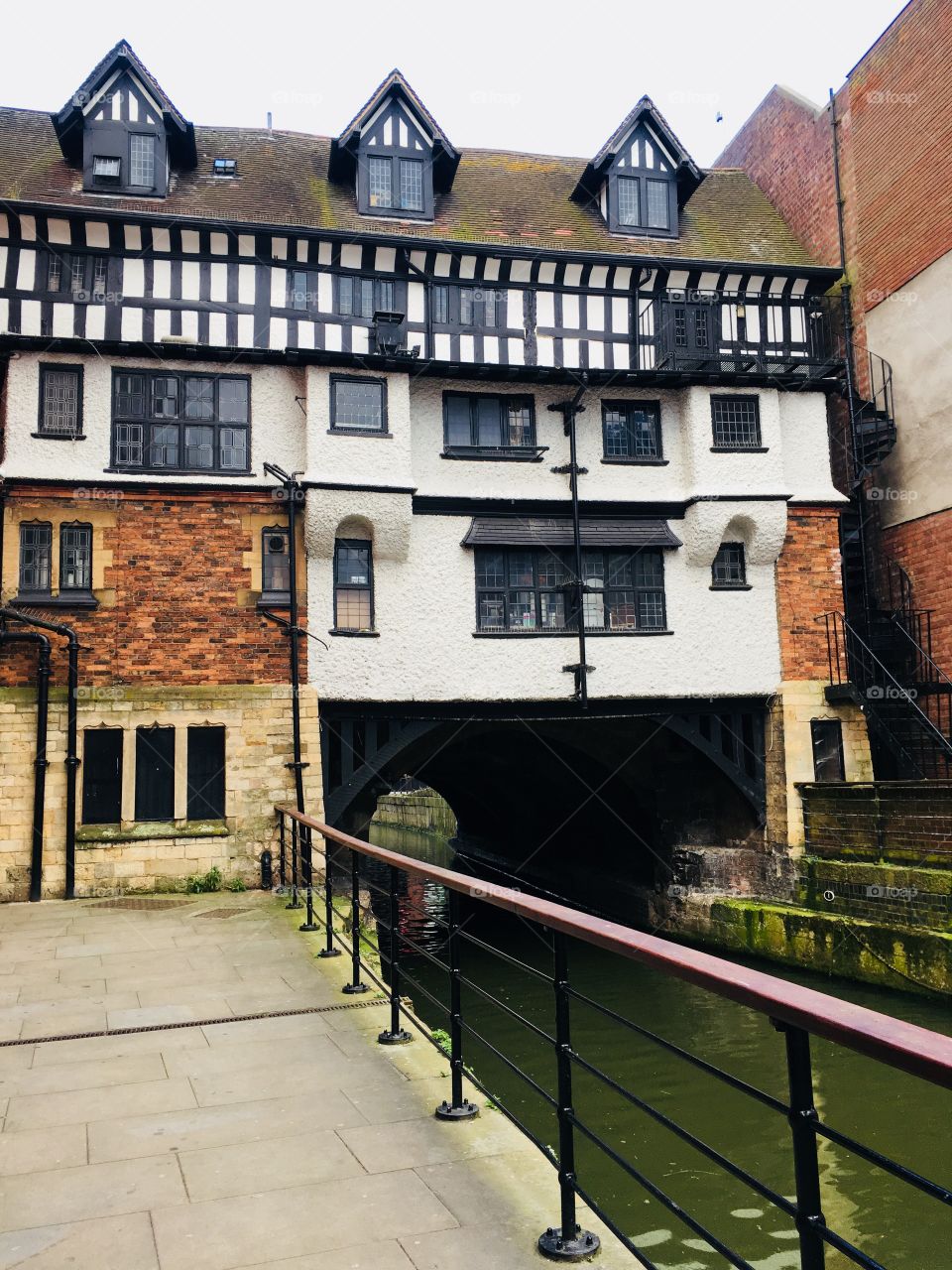 Stokes on High Bridge (oldest bridge with buildings in England) from The Glory Hole also featuring River Witham in Lincoln
