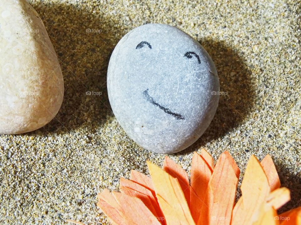 The stones of my son also smile.