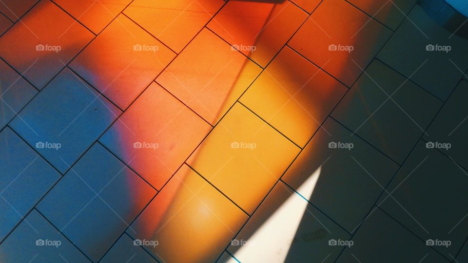 multi-colored refraction of light on a tile