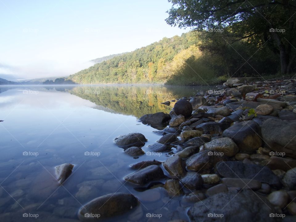 Riverside with rocks.