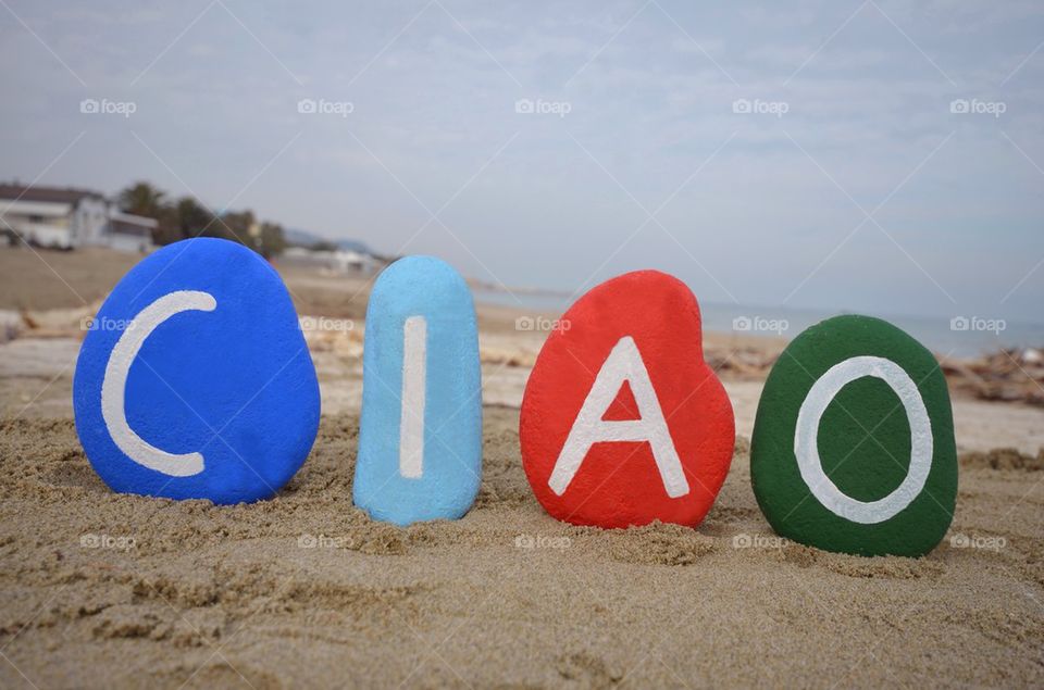 Ciao on colourful stones