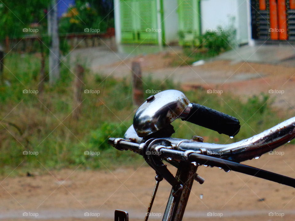 By cycle bell with rain drops